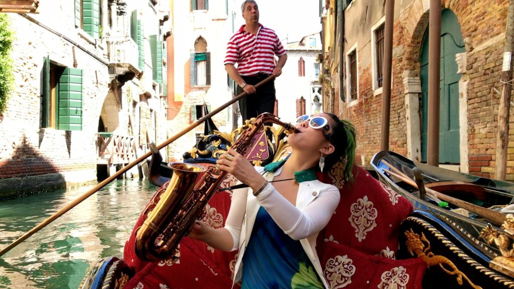 Jazz prodigy Grace Kelly in a gondola in Venice Italy